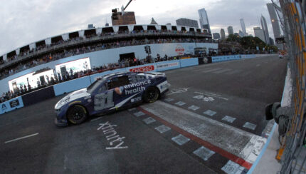 Credit: CHICAGO, ILLINOIS - JULY 02: Shane Van Gisbergen, driver of the #91 Enhance Health Chevrolet, crosses the finish line to win the NASCAR Cup Series Grant Park 220 at the Chicago Street Course on July 02, 2023 in Chicago, Illinois. (Photo by Sean Gardner/Getty Images)